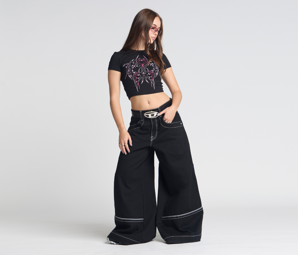 Atomic 34 Inch Super Black Rinse Pants With Bottom Leg Opening 26 Inch Deep Back Pockets And 13 Inch Zipper Compartments