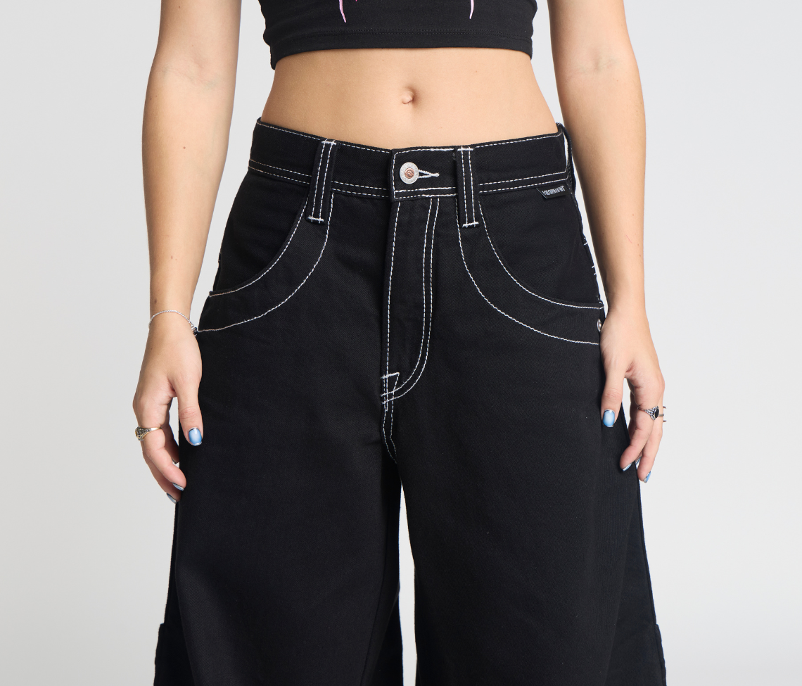 Atomic 34 Inch Super Black Rinse Pants With Bottom Leg Opening 26 Inch Deep Back Pockets And 13 Inch Zipper Compartments