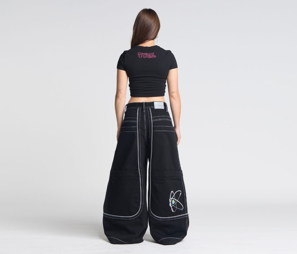 Atomic 34 Inch Super Black Rinse Pants With Bottom Leg Opening 26 Inch Deep Back Pockets And 13 Inch Zipper Compartments