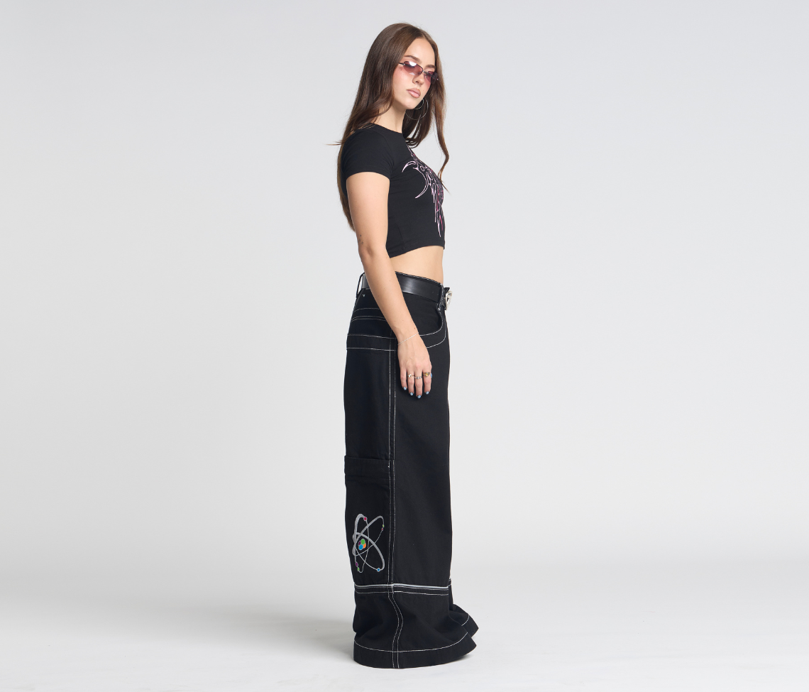 Atomic 34 Inch Super Black Rinse Pants With Bottom Leg Opening 26 Inch Deep Back Pockets And 13 Inch Zipper Compartments